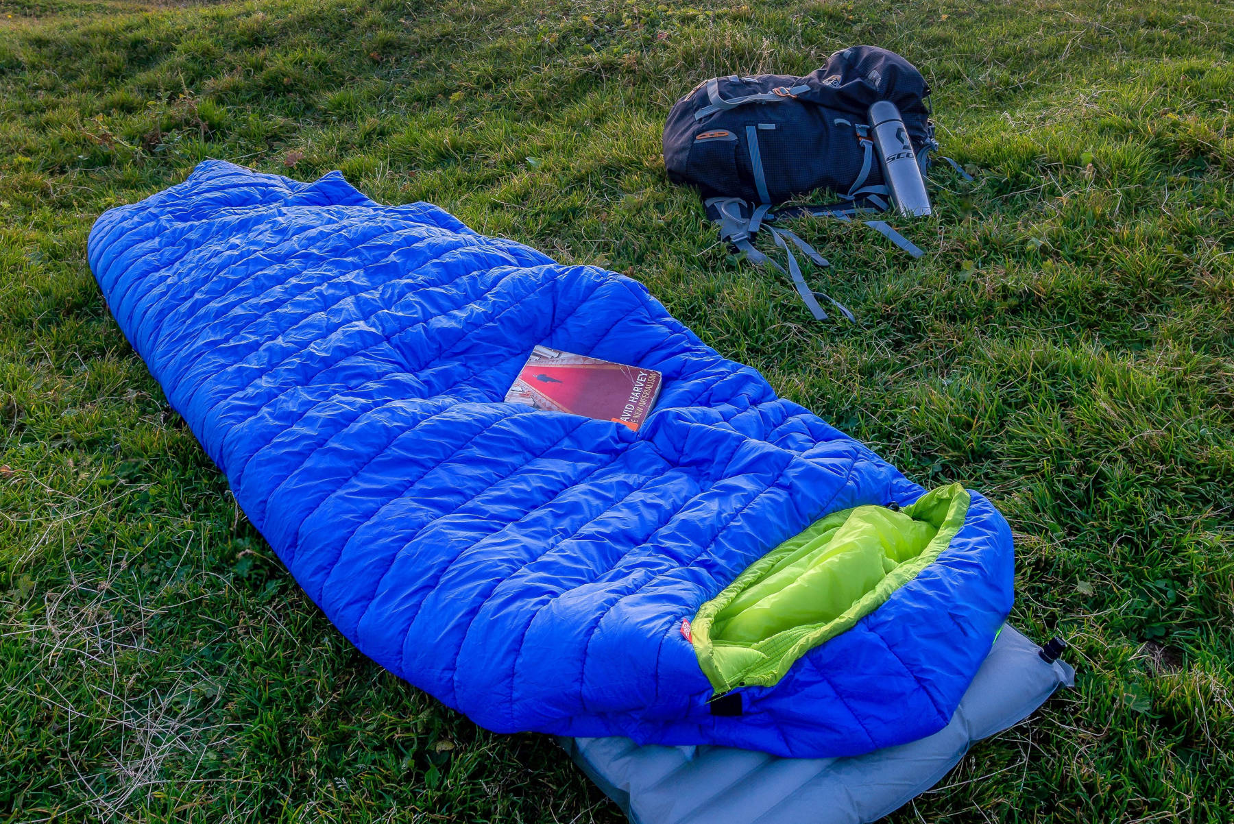 Reading while staying warm in a sleeping bag - Hello Trail