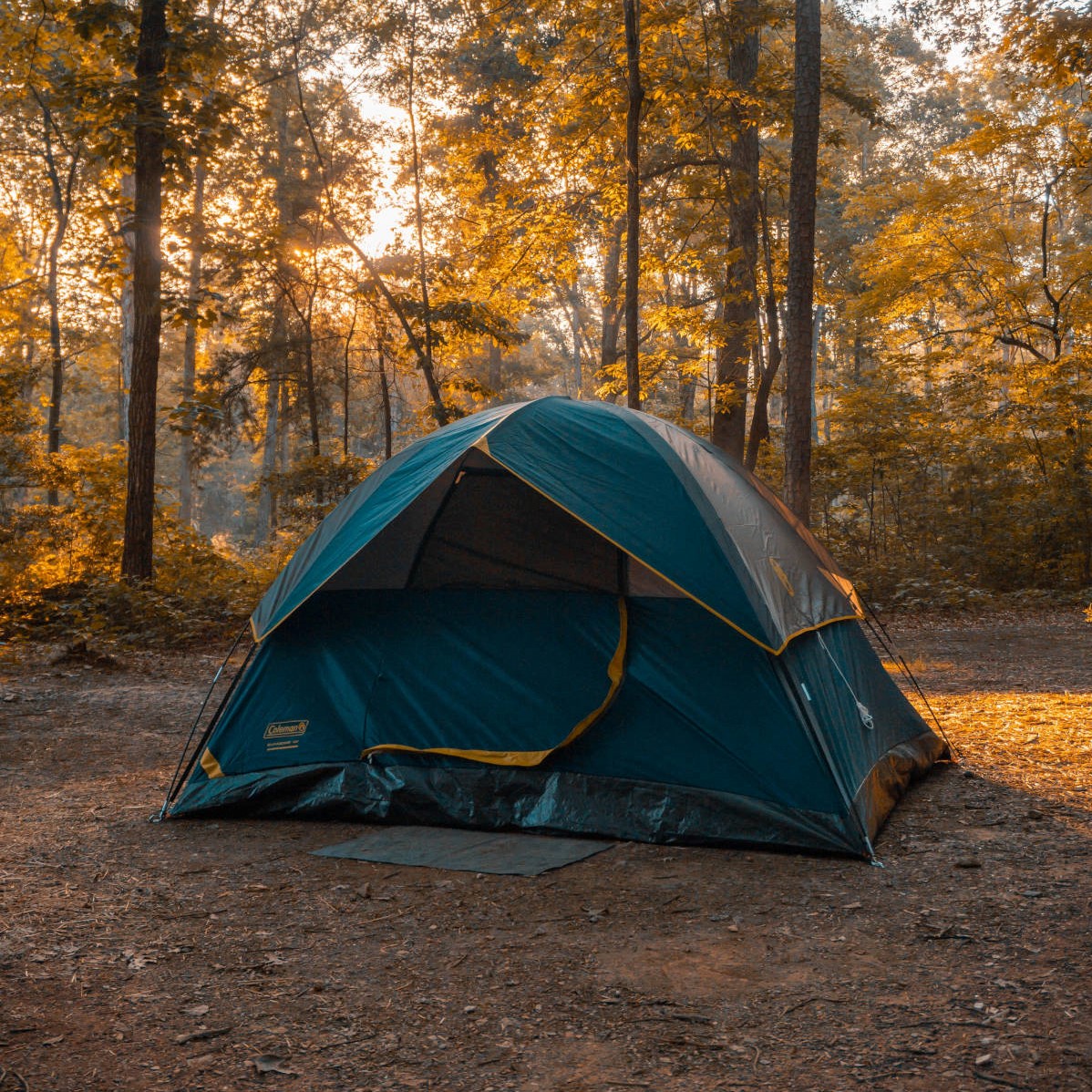 Tent camping in the woods during Fall - Hello Trail